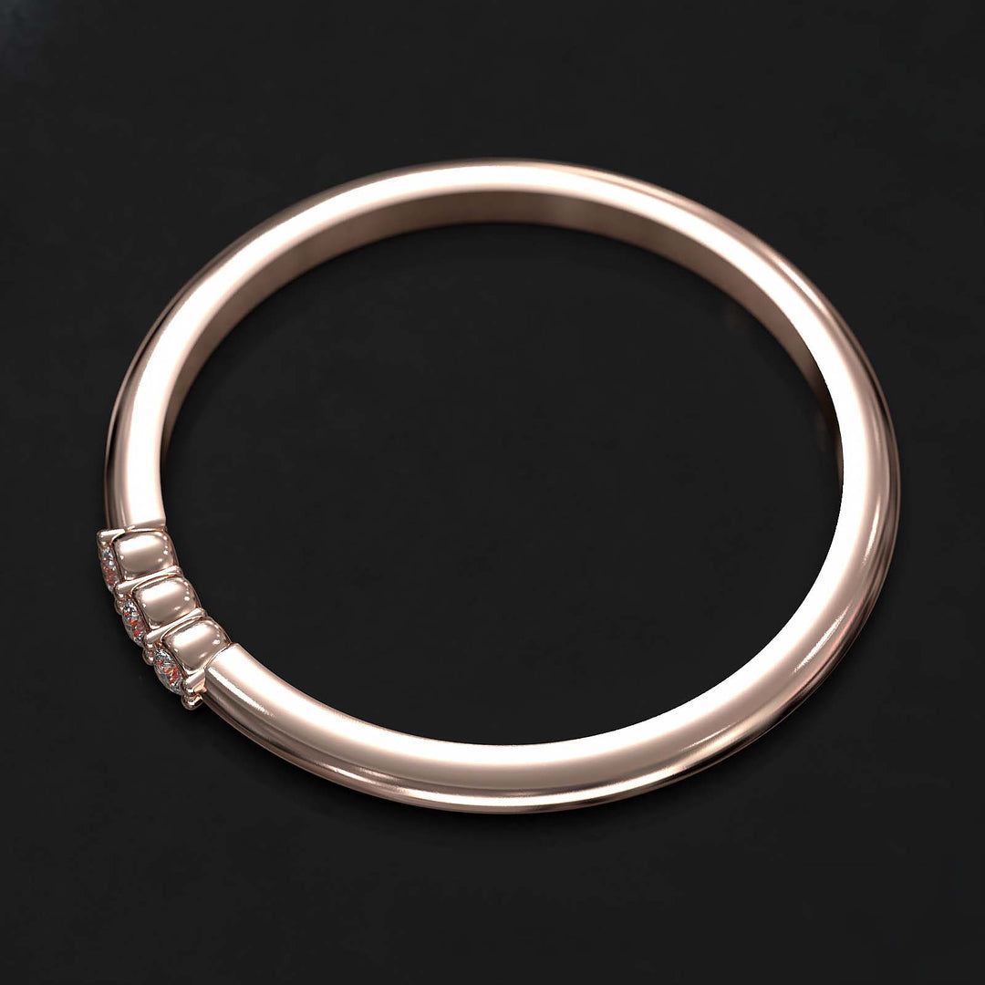 Dainty lab-grown diamond band with three diamonds on top, crafted in gold or platinum.