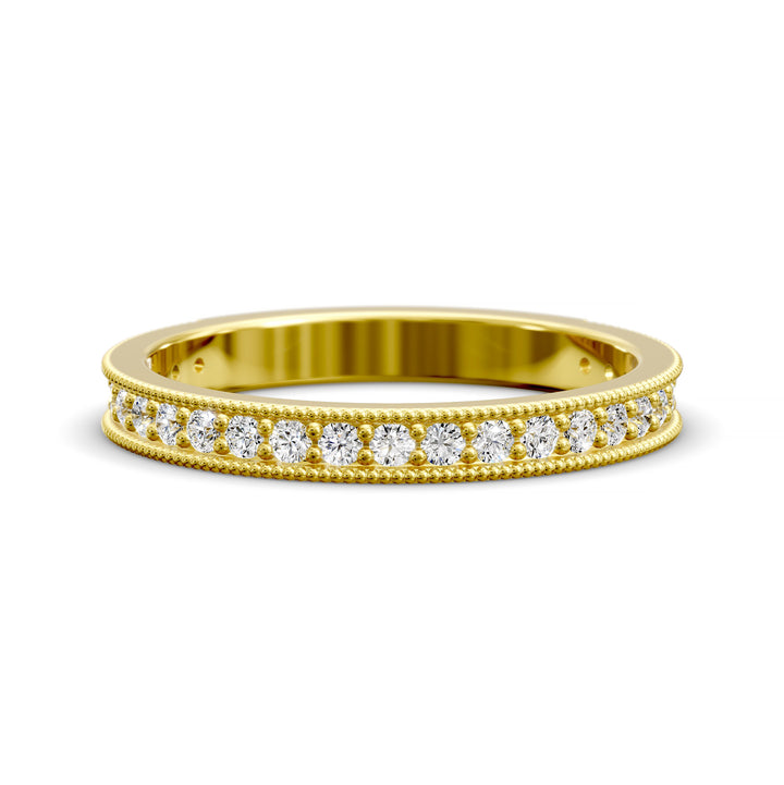 Channel set diamond wedding band with three-quarter eternity and beaded edge