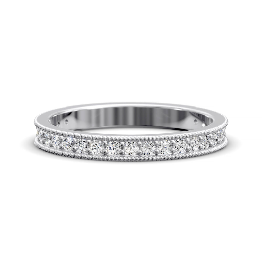 Channel set diamond wedding band with three-quarter eternity and beaded edge