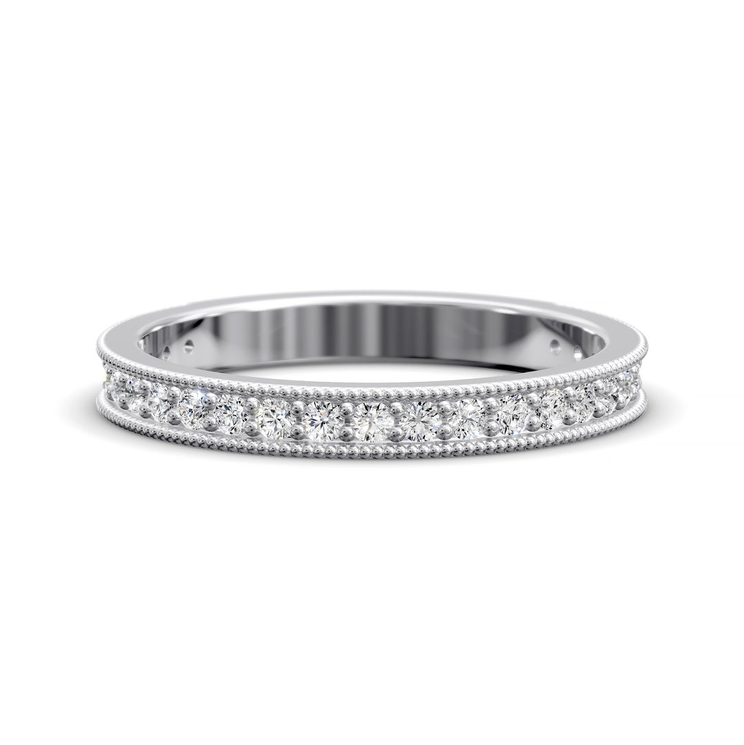 Channel set diamond wedding band with three-quarter eternity and beaded edge