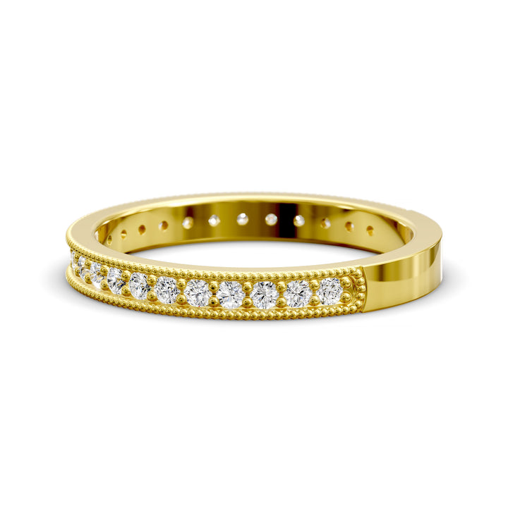 Channel set diamond wedding band with three-quarter eternity and beaded edge