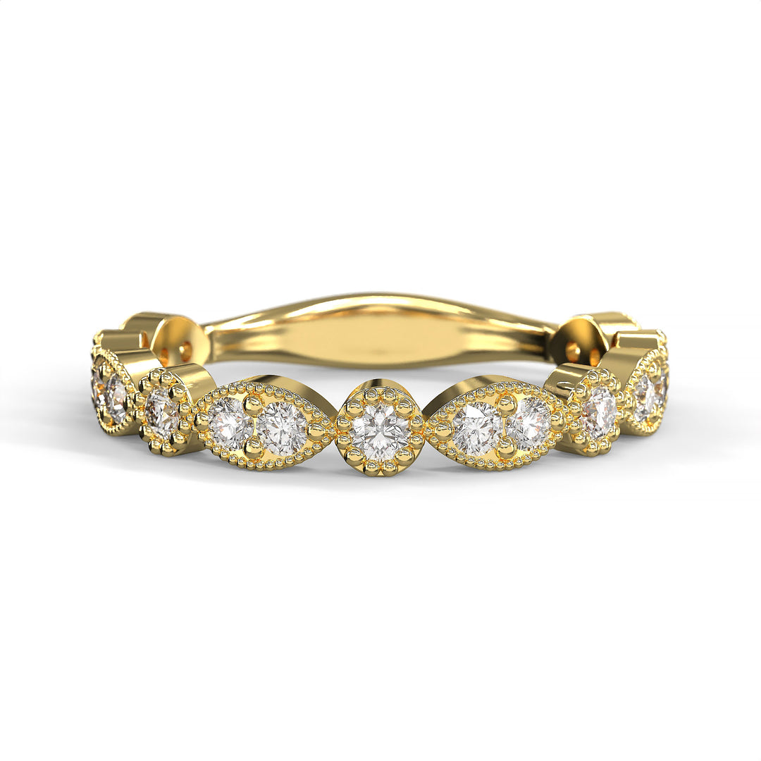 Diamond band with marquise and round bezels featuring vintage-style milgrain accents on a white background