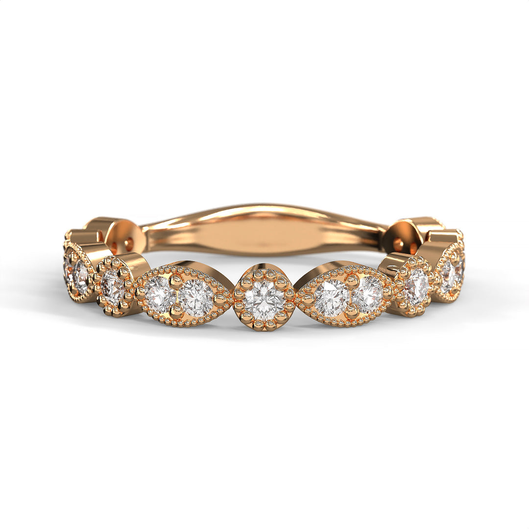 Diamond band with marquise and round bezels featuring vintage-style milgrain accents on a white background