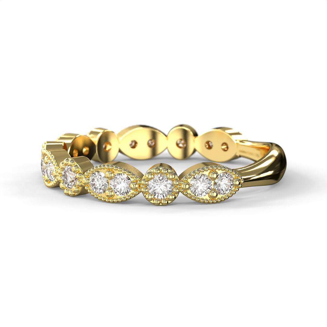 Diamond band with marquise and round bezels featuring vintage-style milgrain accents on a white background