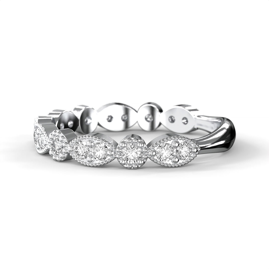 Diamond band with marquise and round bezels featuring vintage-style milgrain accents on a white background