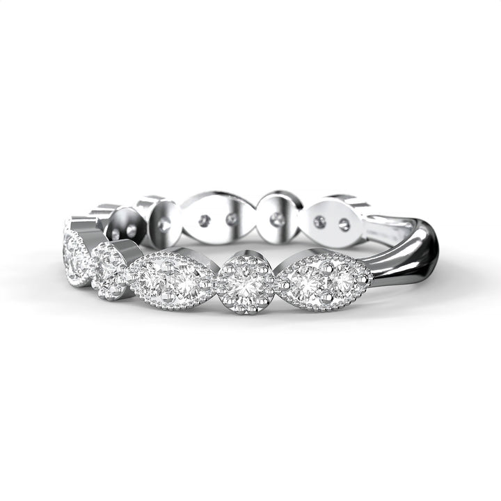 Diamond band with marquise and round bezels featuring vintage-style milgrain accents on a white background