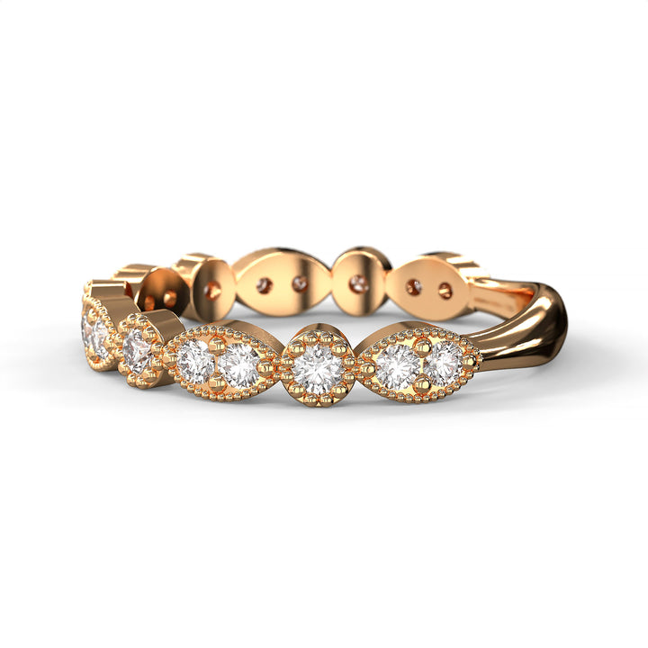 Diamond band with marquise and round bezels featuring vintage-style milgrain accents on a white background