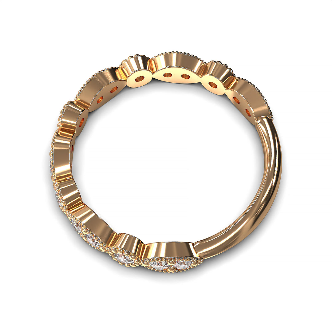 Diamond band with marquise and round bezels featuring vintage-style milgrain accents on a white background