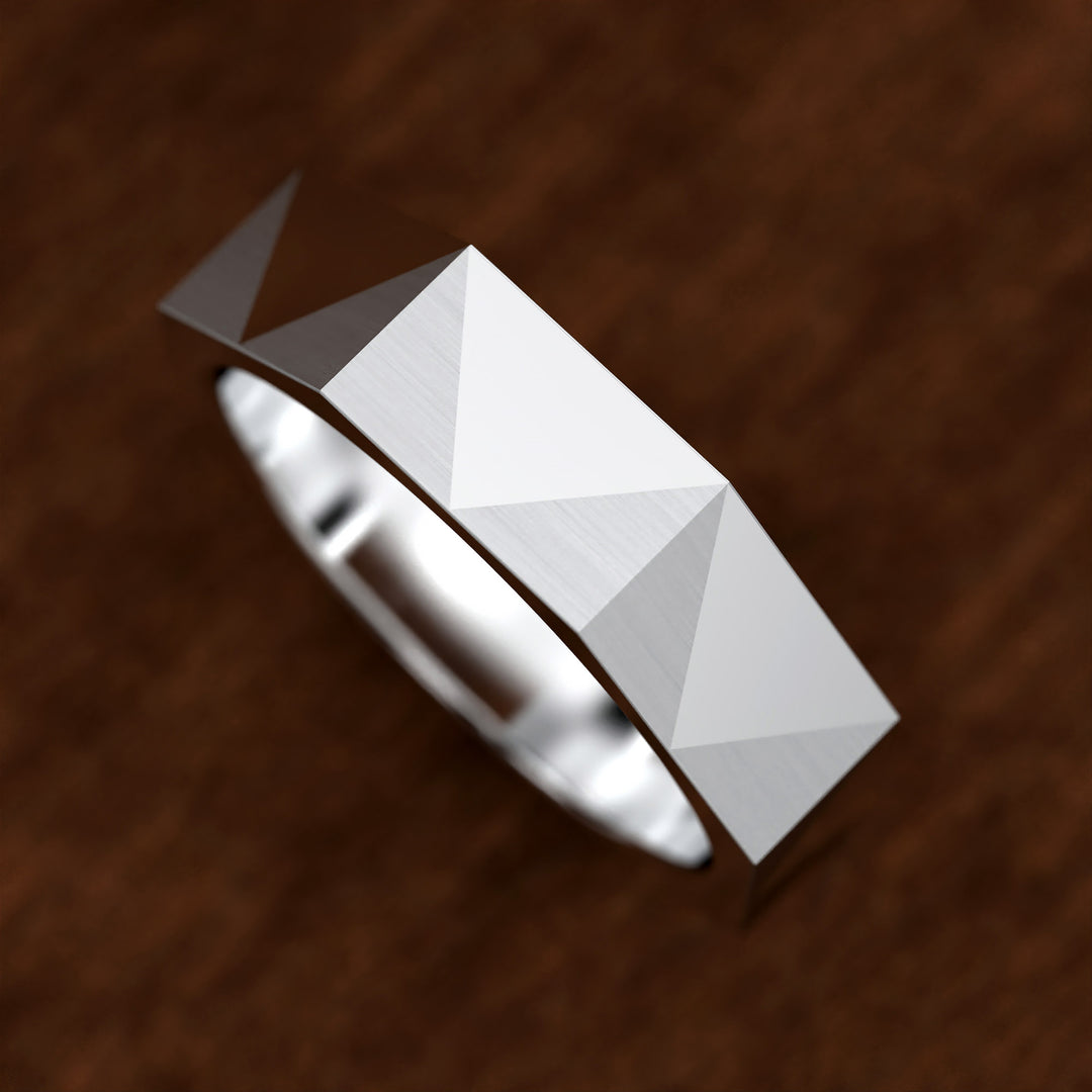 geometric faceted men’s band with brushed and polished planes