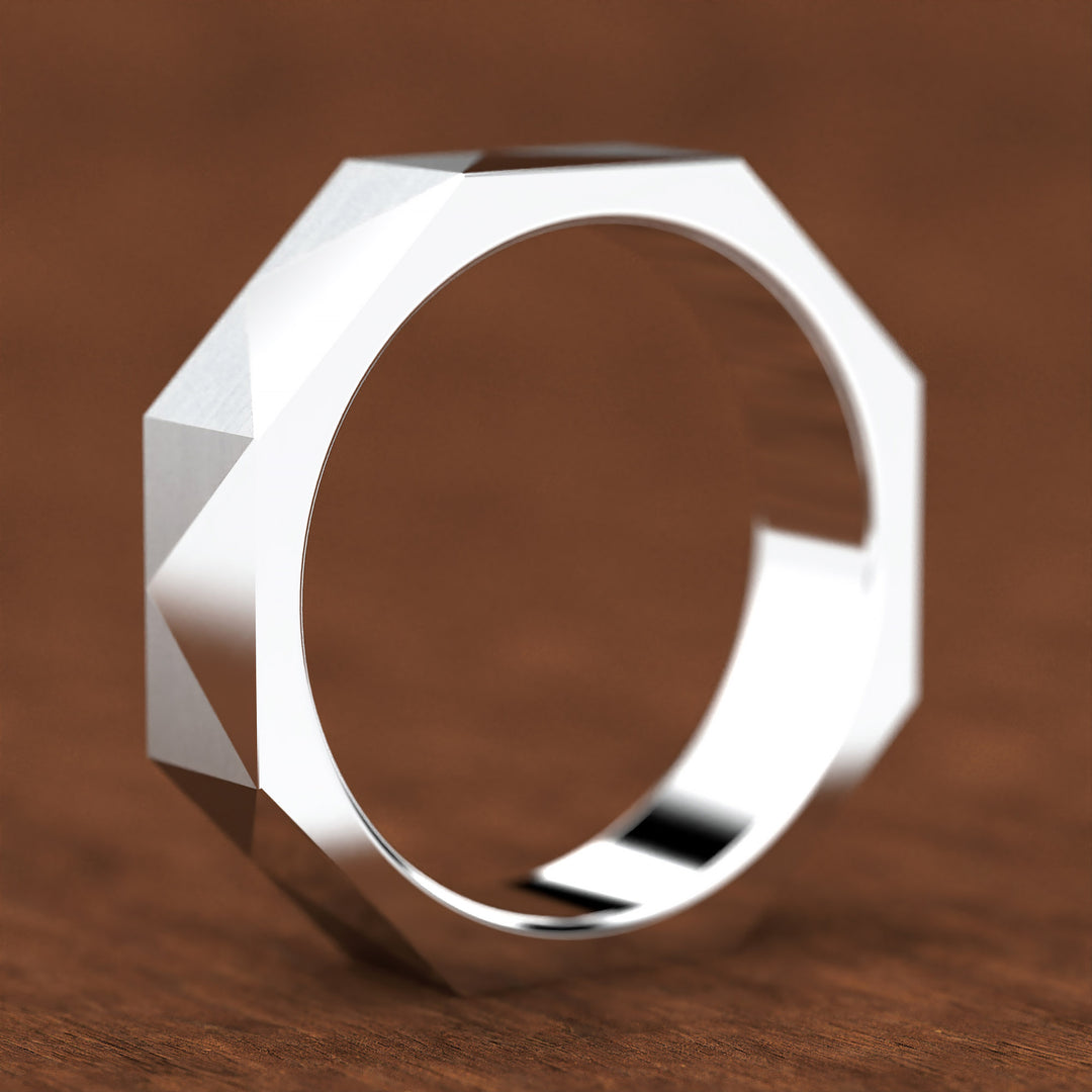 geometric faceted men’s band with brushed and polished planes
