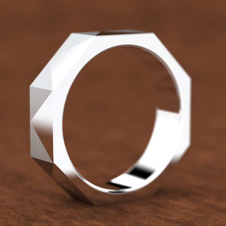 geometric faceted men’s band with brushed and polished planes