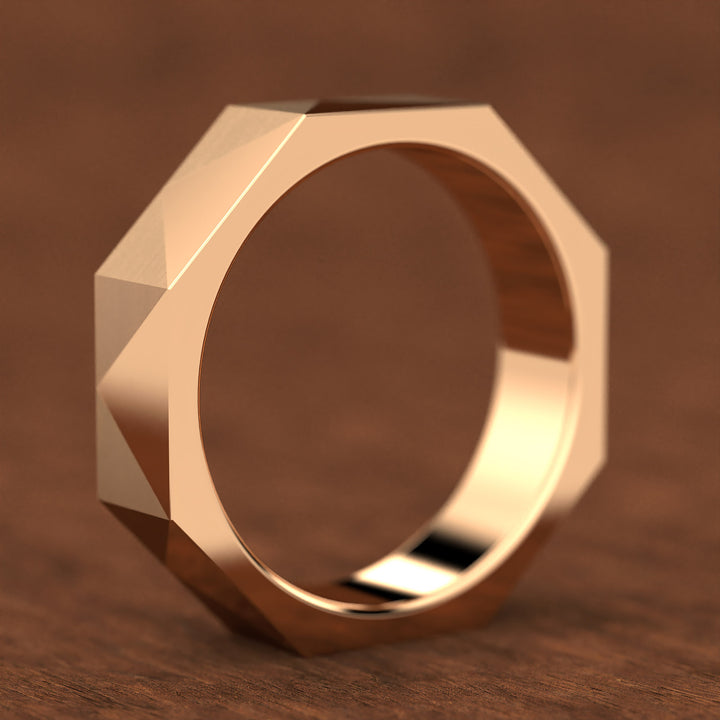 geometric faceted men’s band with brushed and polished planes