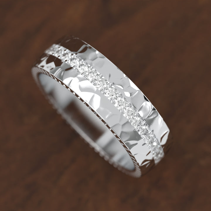 hammered band with extended diamond channel row and textured edges