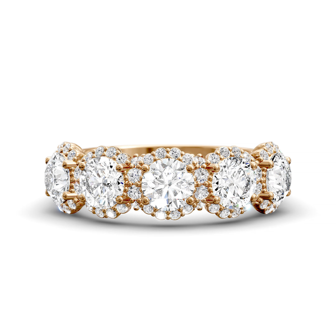 Gold halo band with large round center stones surrounded by sparkling diamond accents