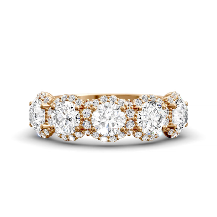 Gold halo band with large round center stones surrounded by sparkling diamond accents