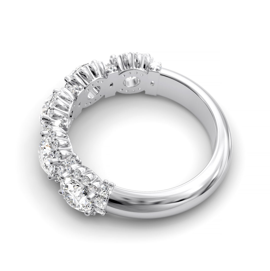 Gold halo band with large round center stones surrounded by sparkling diamond accents