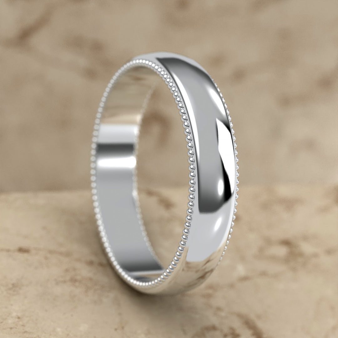 high-polish domed wedding band with fine milgrain borders