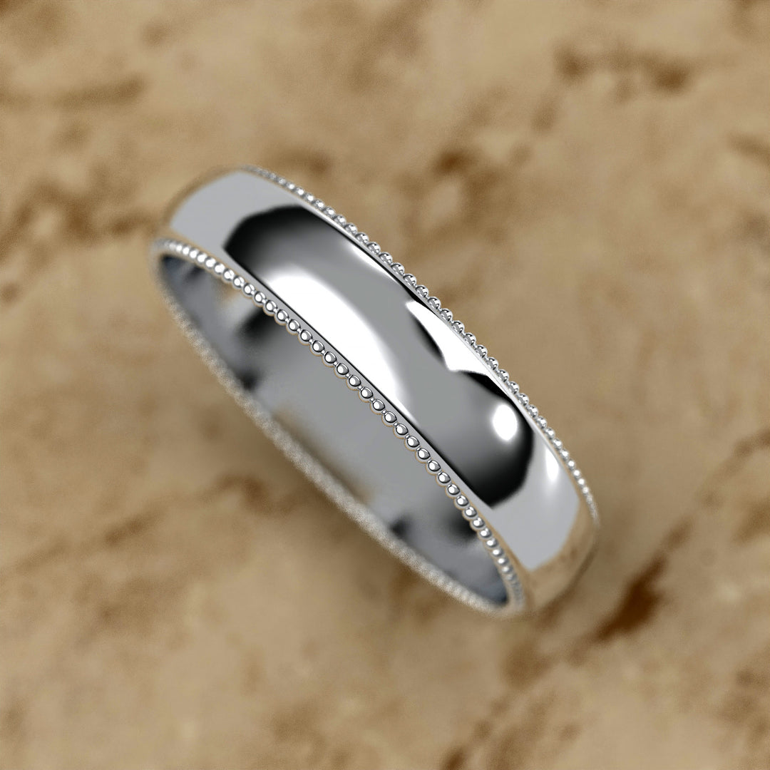 high-polish domed wedding band with fine milgrain borders