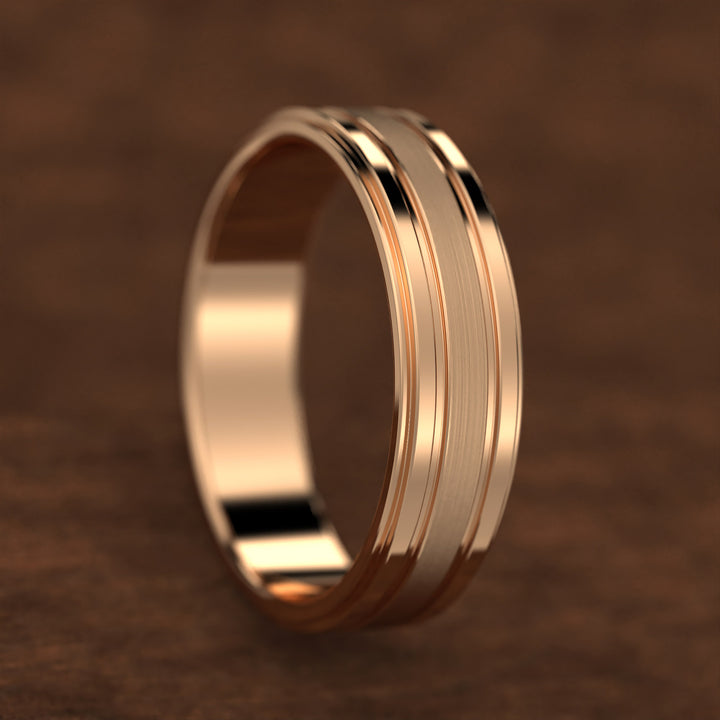 men’s band with ice-cut textured center and polished dual grooves