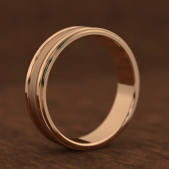 men’s band with ice-cut textured center and polished dual grooves