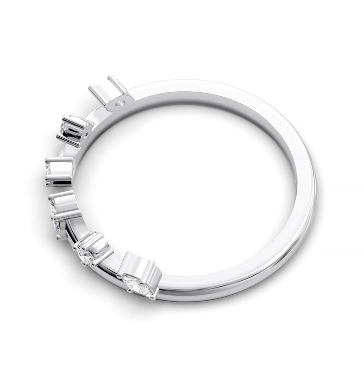 Curved open band with marquise and round diamonds set in a modern gold design