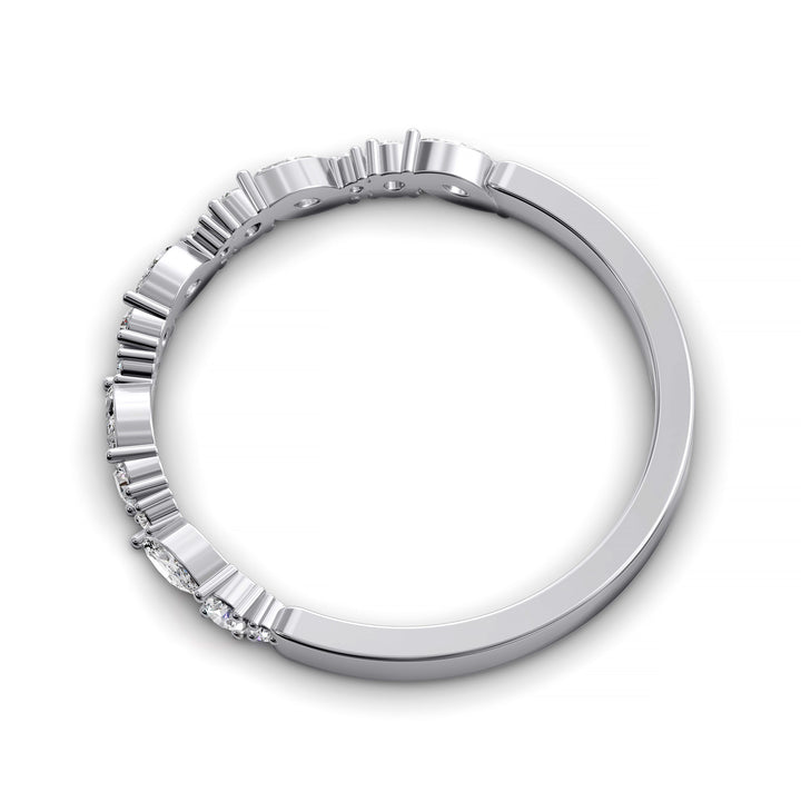 Wedding band with alternating marquise and round diamonds in prong setting