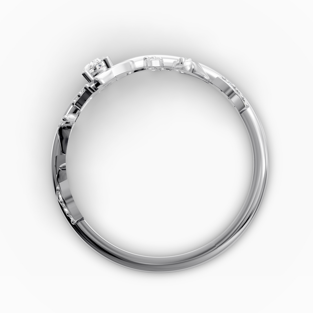 Leaf and vine wedding band with pear-shaped center stone and small accent stones