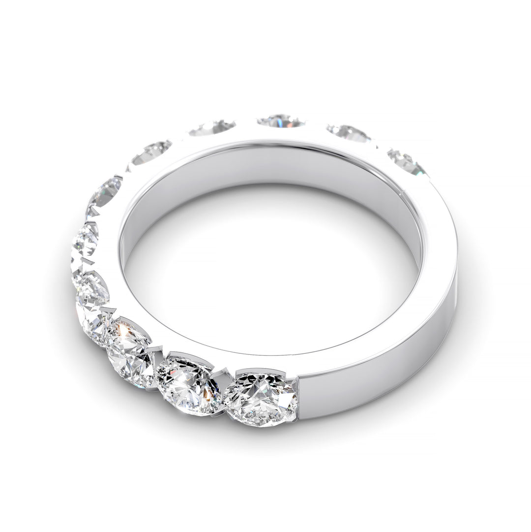 Wide gold pavé band with large round brilliant diamonds in eternity style