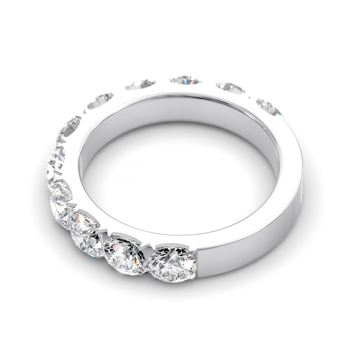 Wide gold pavé band with large round brilliant diamonds in eternity style