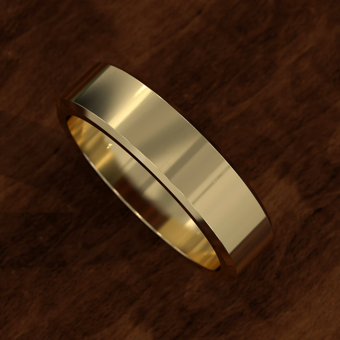 Polished flat men’s wedding band with beveled edges