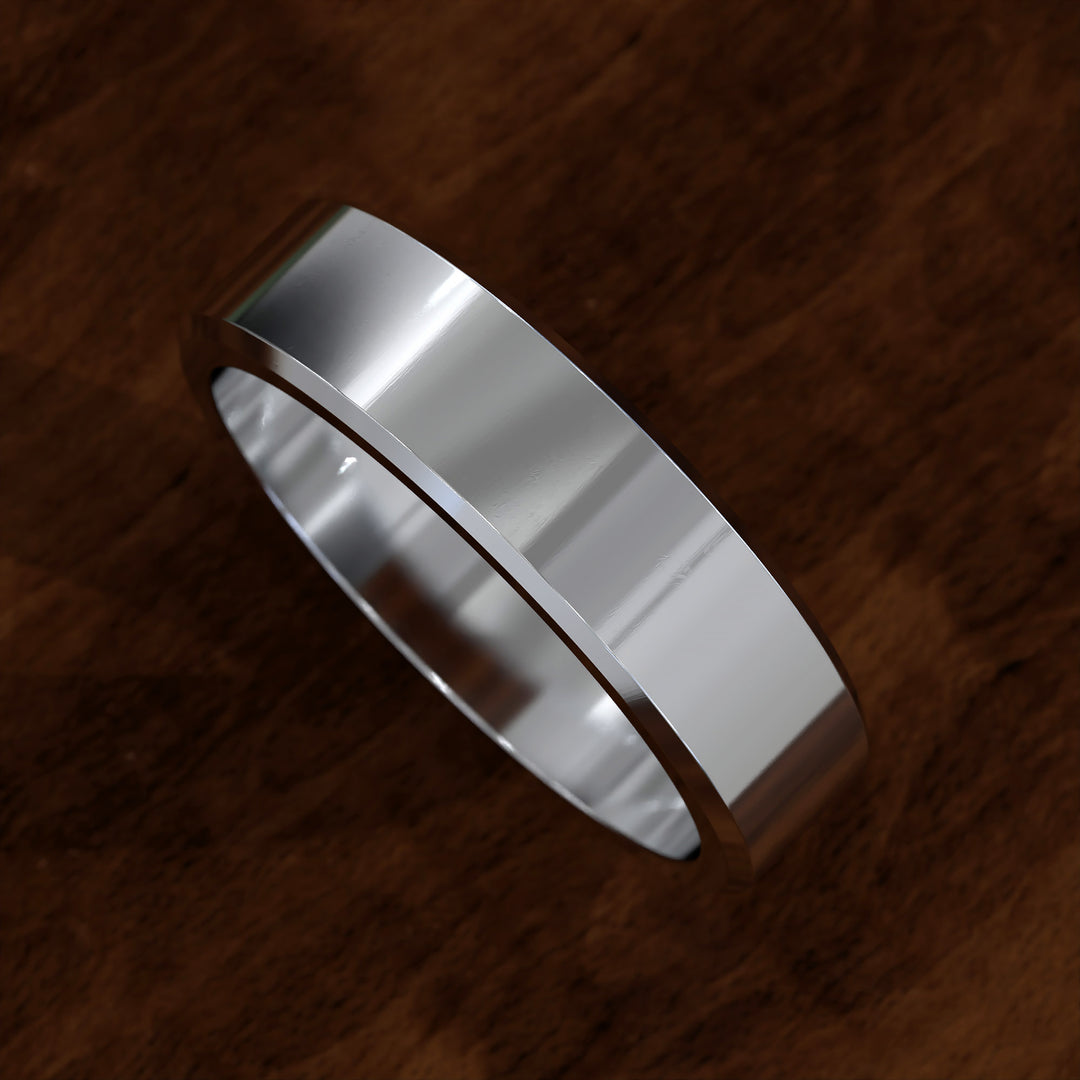 Polished flat men’s wedding band with beveled edges