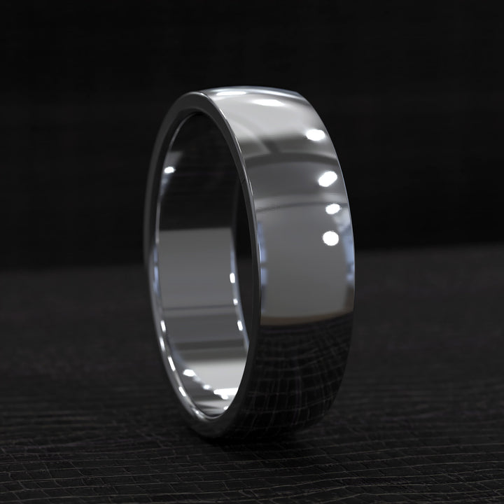polished half round men’s wedding band with smooth curved design