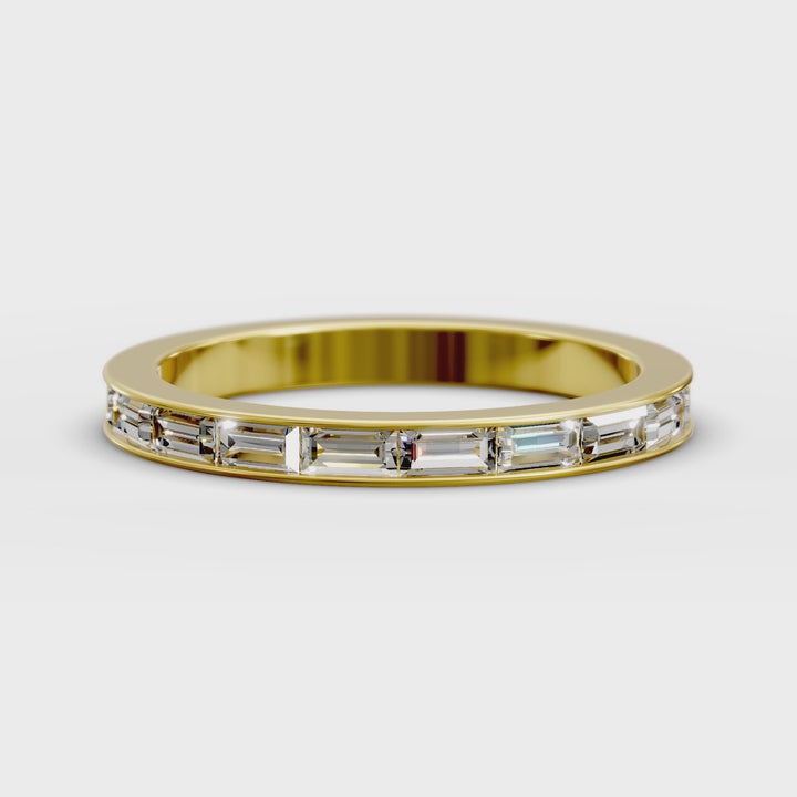 Baguette Diamond Channel Set Half Eternity Wedding Band rotating on white background