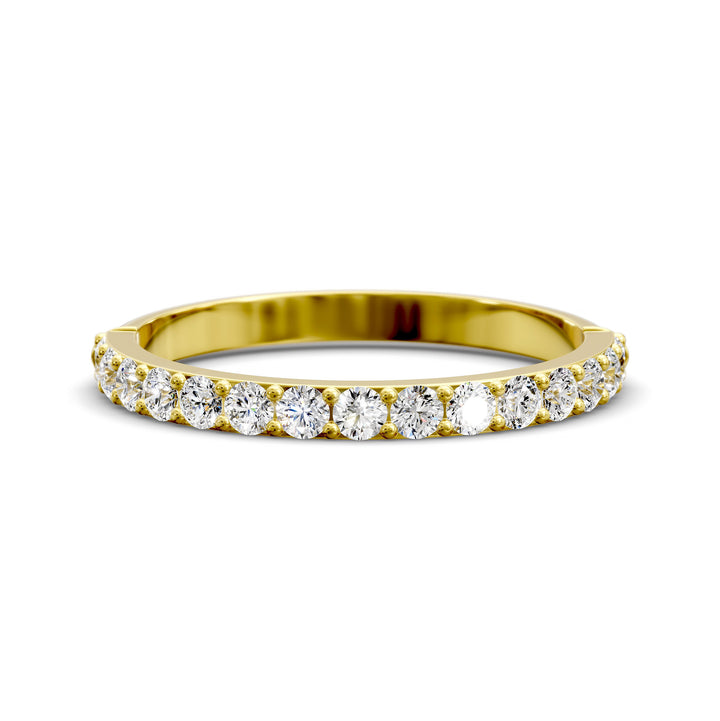 Half eternity band with prong set round diamonds in classic wedding style