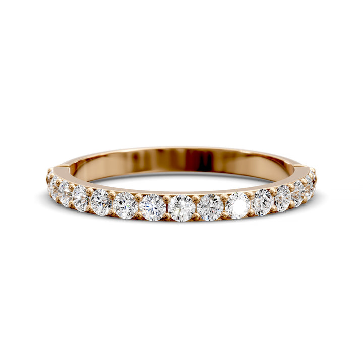 Half eternity band with prong set round diamonds in classic wedding style