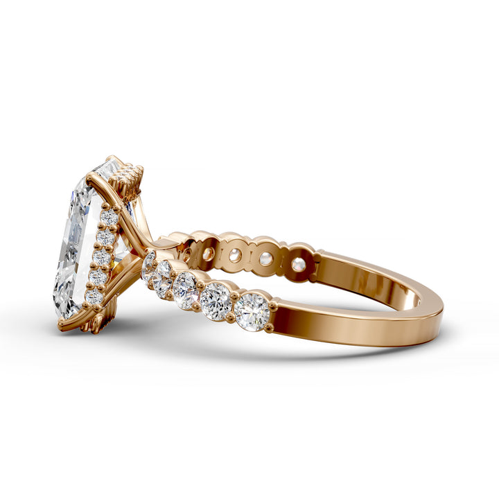 Radiant cut hidden halo engagement ring with seamless prong setting and pave band