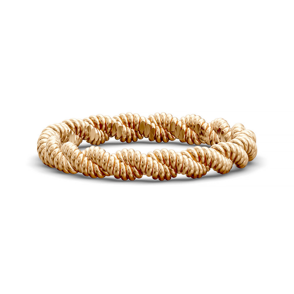 Close-up of twisted rope-style wedding band with detailed ridged texture