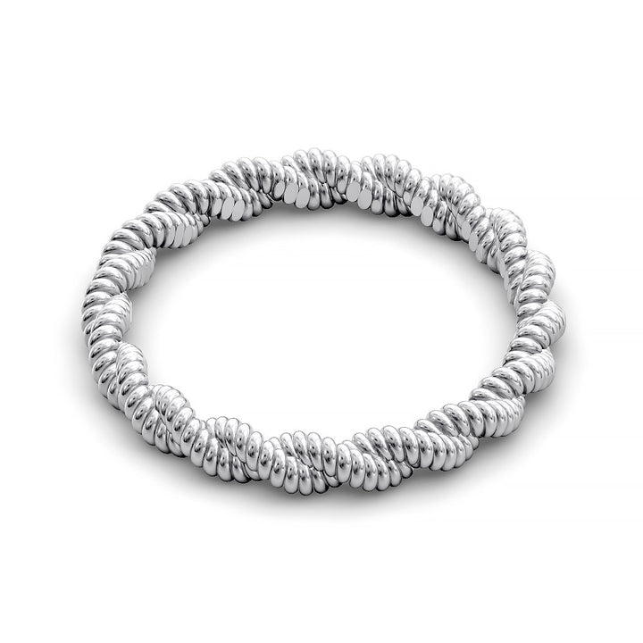 Close-up of twisted rope-style wedding band with detailed ridged texture