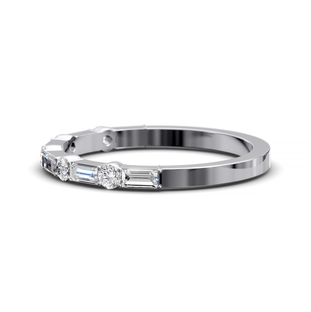 Modern gold wedding band with alternating round and baguette-cut diamonds