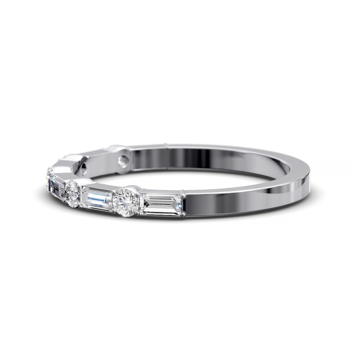 Modern gold wedding band with alternating round and baguette-cut diamonds