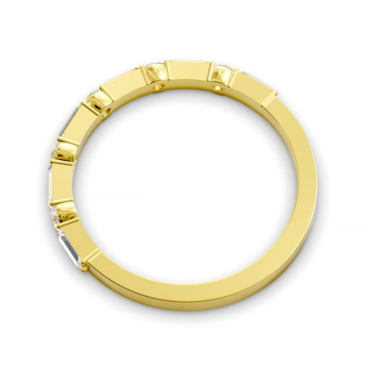 Modern gold wedding band with alternating round and baguette-cut diamonds