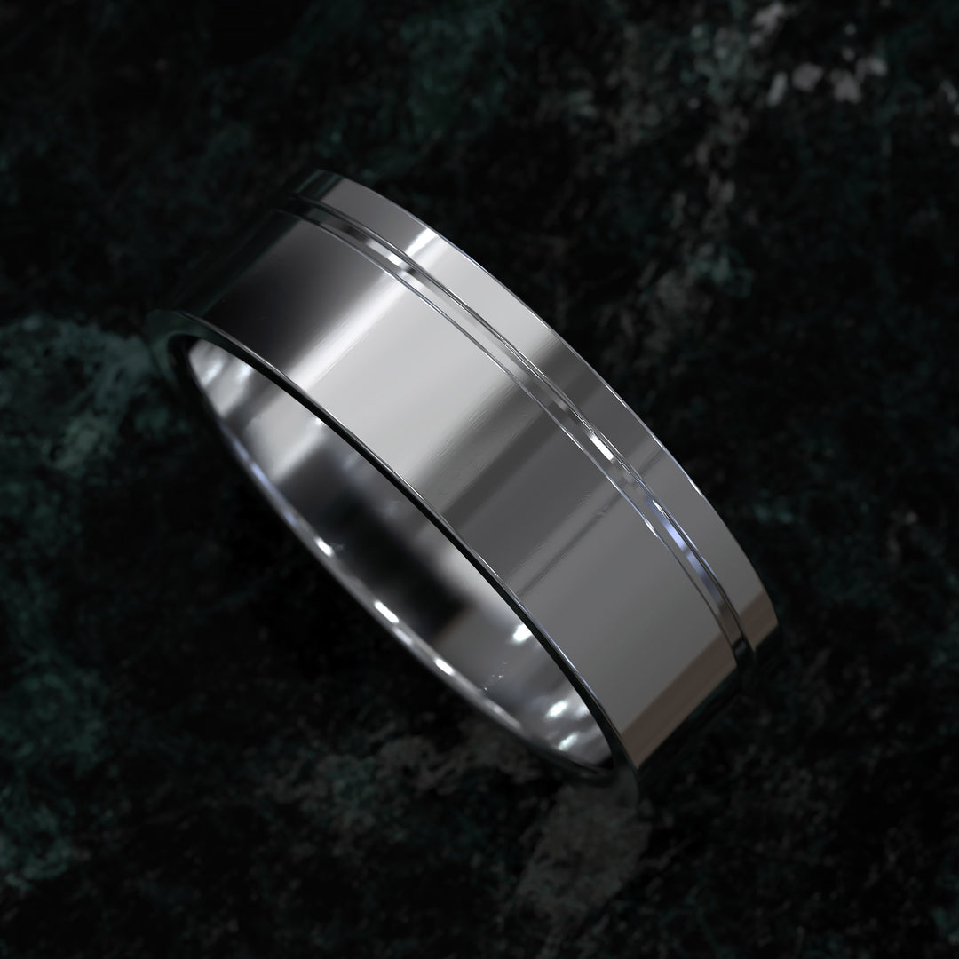 flat profile men’s wedding band with single polished edge design