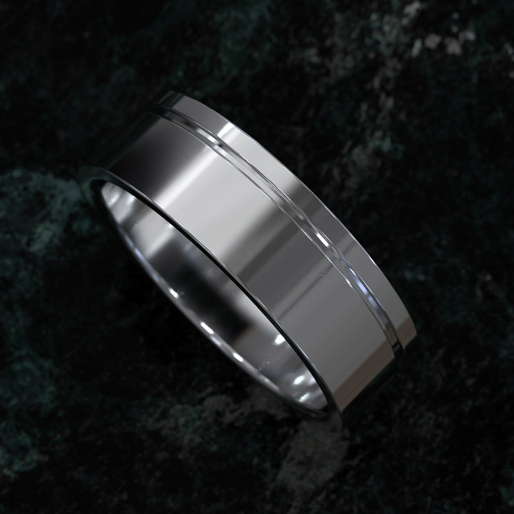 flat profile men’s wedding band with single polished edge design