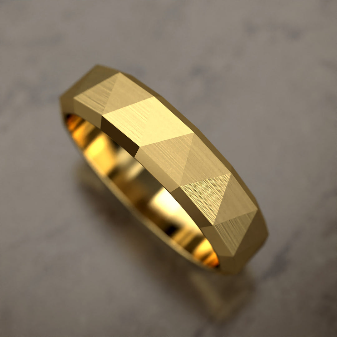 faceted geometric band with brushed triangular pattern