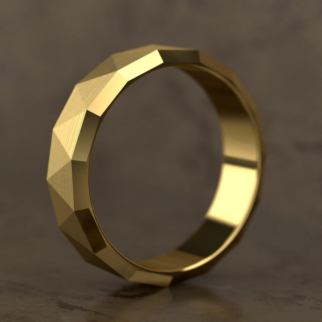faceted geometric band with brushed triangular pattern
