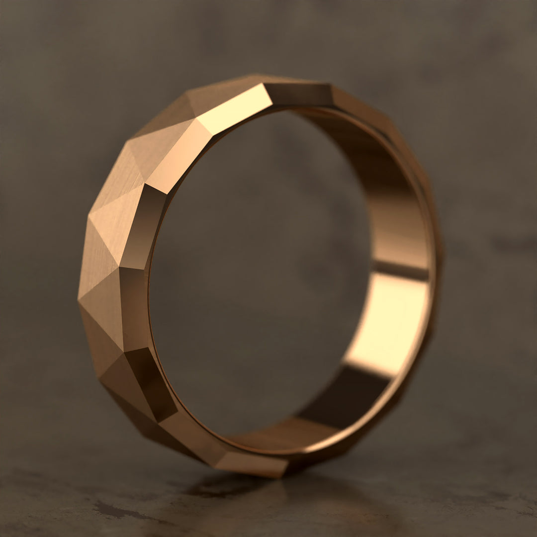 faceted geometric band with brushed triangular pattern