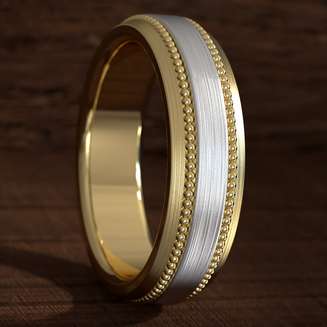 Two-tone hammered wedding band with milgrain edges