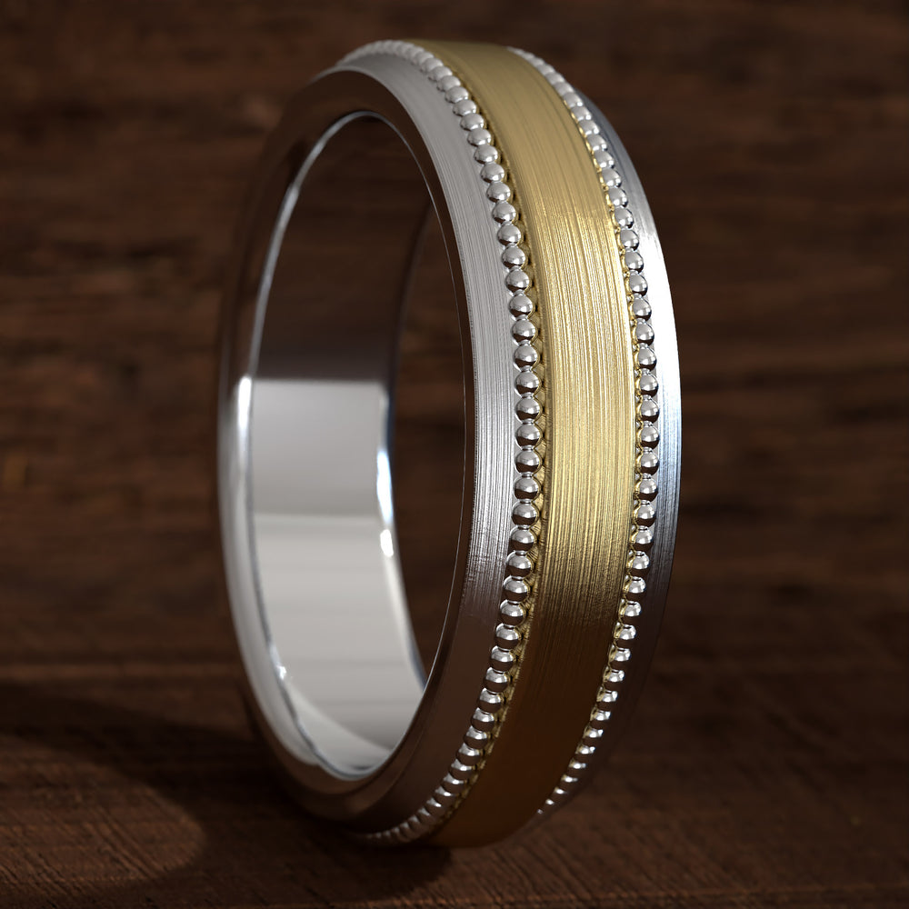 Two-tone hammered wedding band with milgrain edges