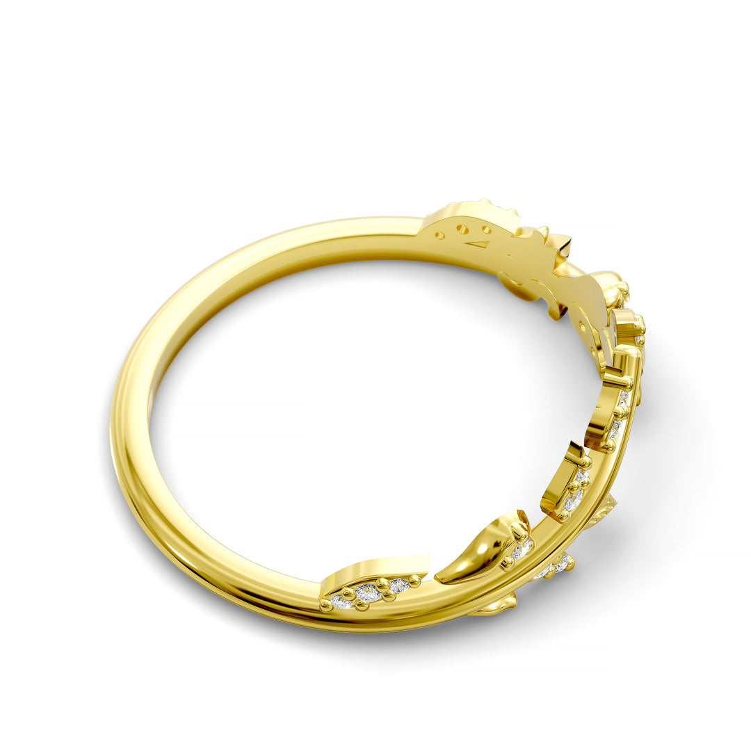 V-shaped nature-inspired wedding band with leaf motifs and round stones