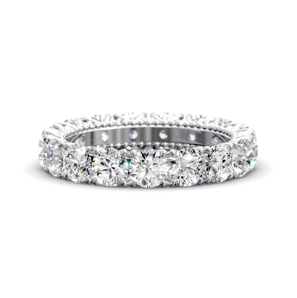 Vintage-inspired eternity band with round cut diamonds and intricate scalloped setting